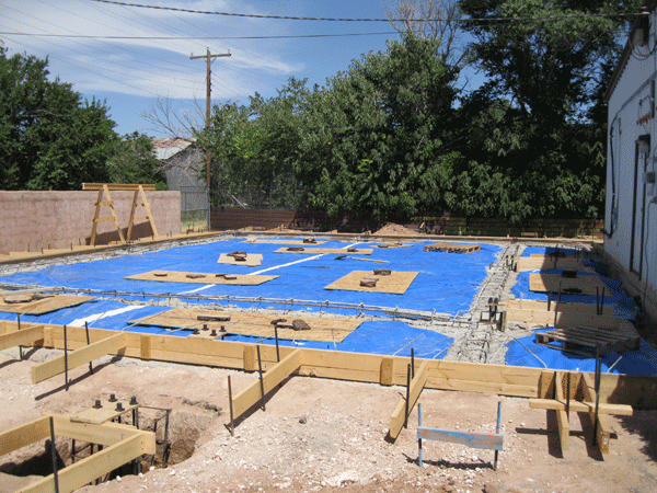 Footings have been poured; preparations for concrete floor, August 13, 2016